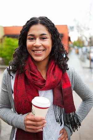 Portrait of Woman Holding Coffee Cup Foto de stock - Direito Controlado, Número: 700-03814981