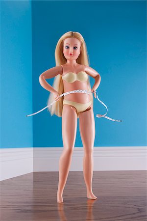 Plus Size Doll Measuring Waist Stock Photo - Rights-Managed, Code: 700-03815226