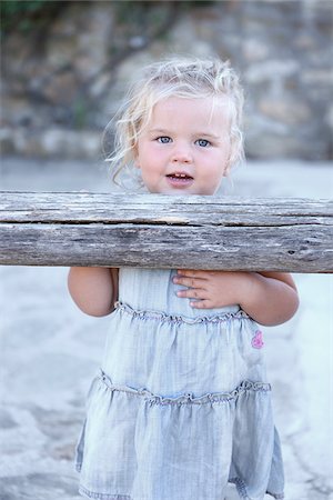 Cute little girl with blonde hair and blue eyes Stock Photos - Page 1 :  Masterfile
