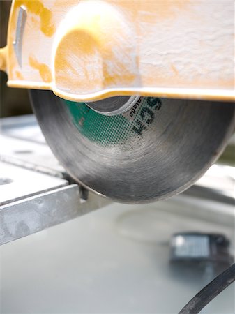 dust (dry particles) - Close-Up of Circular Saw Foto de stock - Con derechos protegidos, Código: 700-03836273