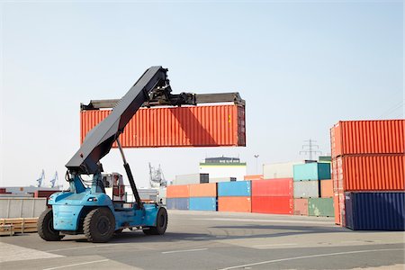 Moving Shipping Containers at Dockyard Stock Photo - Rights-Managed, Code: 700-03836361