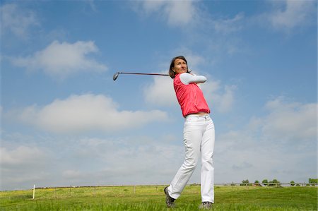 Femme jouant Golf Photographie de stock - Rights-Managed, Code: 700-03848809