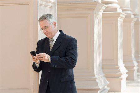 executive suits for senior men - Businessman with Cell Phone Stock Photo - Rights-Managed, Code: 700-03848839