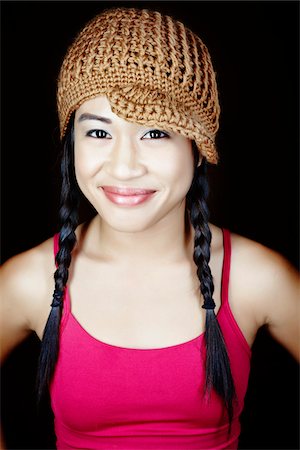 Portrait of Smiling Woman Wearing Hat Stock Photo - Rights-Managed, Code: 700-03848879