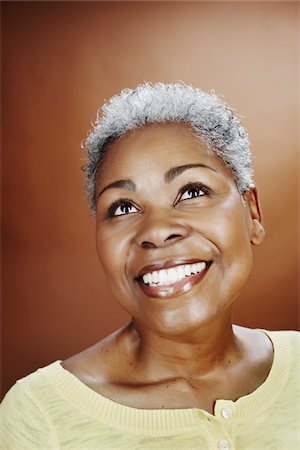 silver hair smile alone - Portrait of Smiling Woman Looking Up Stock Photo - Rights-Managed, Code: 700-03848888