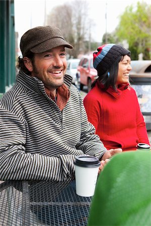 enjoying coffee together - Man and Woman at Cafe Stock Photo - Rights-Managed, Code: 700-03849379