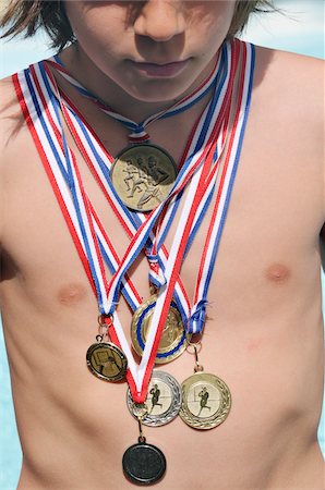 Garçon portant des médailles Photographie de stock - Rights-Managed, Code: 700-03849542