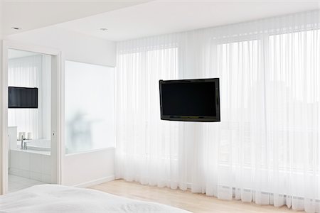 Bedroom with Television Stock Photo - Rights-Managed, Code: 700-03865324