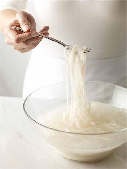 Woman Making Pad Thai Stock Photo - Premium Rights-Managed, Artist: Michael Alberstat, Image code: 700-03865331