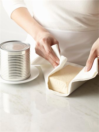 Woman Preparing Tofu Foto de stock - Con derechos protegidos, Código: 700-03865332