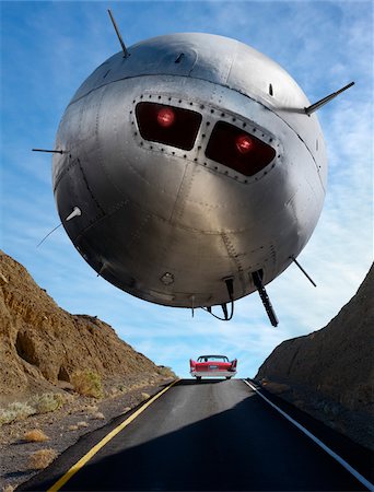 simsearch:700-06368058,k - UFO Hovering Over Car on Highway Stock Photo - Rights-Managed, Code: 700-03891189