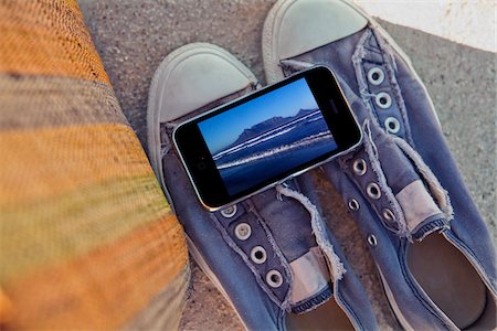 smartphone at beach - Still Life of Smart Phone and Shoes Stock Photo - Rights-Managed, Code: 700-03907385