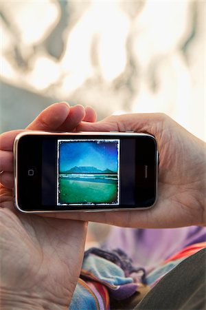 smartphone at beach - Woman's Hands Holding Smartphone Stock Photo - Rights-Managed, Code: 700-03907387