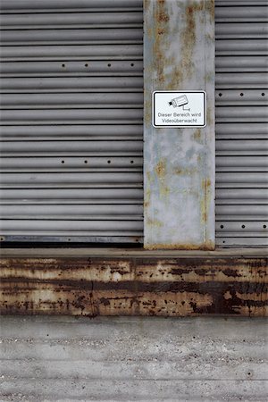 Security Camera Sign at Loading Bay, Hamburg, Germany Stock Photo - Rights-Managed, Code: 700-03958145