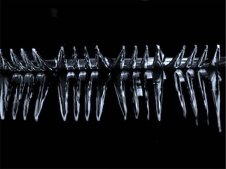 simsearch:824-07310346,k - Metal Forks Lined Up In An Abstract Way Foto de stock - Con derechos protegidos, Código: 824-07310347