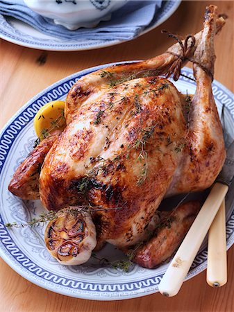 rôti (viande) - Whole roast chicken Photographie de stock - Rights-Managed, Code: 824-07585806