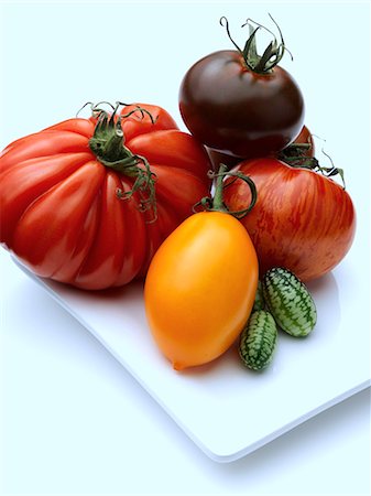 red fruit and white background - Heritage beefsteak yellow banana tomato Stock Photo - Rights-Managed, Code: 824-07585872