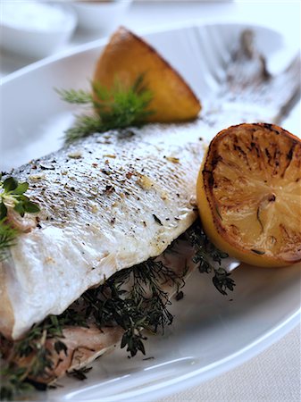 fish bones on plate - Baked sea bass with dill and thyme Stock Photo - Rights-Managed, Code: 824-07586090