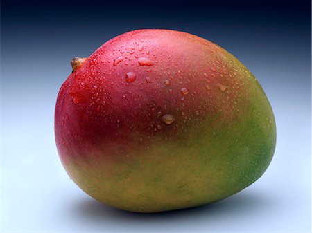 Whole ripe mango Fotografie stock - Rights-Managed, Codice: 824-07586124