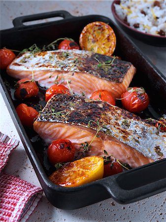 romantic meal - Roasted Salmon with cherry tomatoes and coconut rice Stock Photo - Rights-Managed, Code: 824-07586227