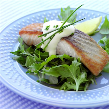 Salmon fillet with Hollandaise sauce & rocket salad Stock Photo - Rights-Managed, Code: 824-03744598