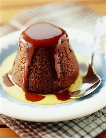 food photography chocolate pouring - Individual dark chocolate runny pudding Stock Photo - Rights-Managed, Code: 825-05814007