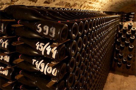 reserve (stored, stock-pile) - Bottles of wine in a cellar Stock Photo - Rights-Managed, Code: 825-05814347