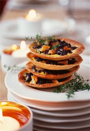 Haddock and blood sausage tartlets Foto de stock - Con derechos protegidos, Código: 825-05814419