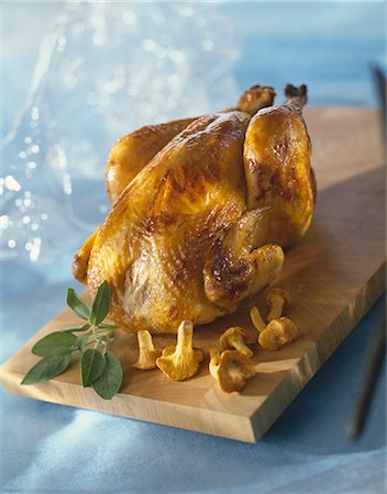 roast (cut of meat) - Roast chicken with chanterelles and sage Stock Photo - Rights-Managed, Code: 825-05814428