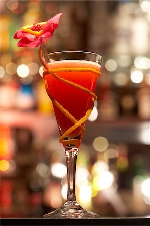 simsearch:825-05814570,k - Orange cocktail mit Blume Stockbilder - Lizenzpflichtiges, Bildnummer: 825-05814568