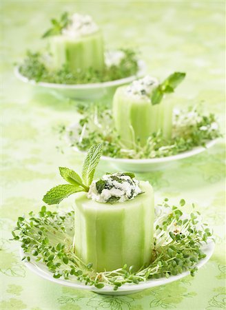 simsearch:825-05814685,k - Slices of cucumber stuffed with fromage frais and fresh mint Stock Photo - Rights-Managed, Code: 825-05814669