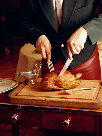 simsearch:825-06817272,k - Carving a duck in a restaurant Stock Photo - Rights-Managed, Code: 825-05814750