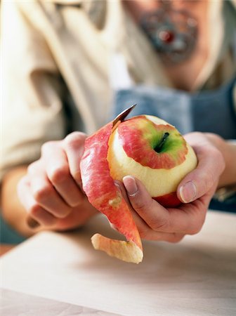 peeling fruit - Person peeling an apple Stock Photo - Rights-Managed, Code: 825-05814784