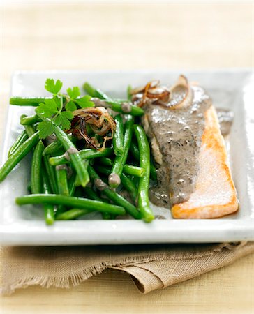 simsearch:652-05809317,k - Salmon fillet with creamy olive sauce Stock Photo - Rights-Managed, Code: 825-05815849