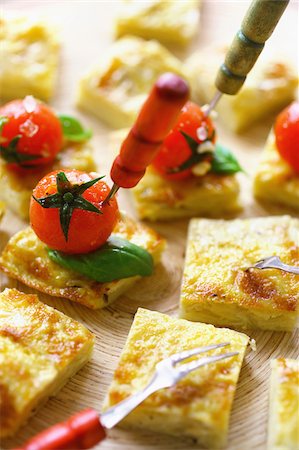 potato cube - potato tortillas with cherry tomatoes Stock Photo - Rights-Managed, Code: 825-05811279