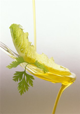 flowing oil - lettuce leaf and olive oil Stock Photo - Rights-Managed, Code: 825-05811335