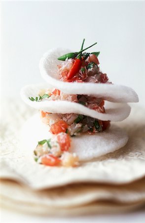 simsearch:652-05807648,k - Sea bream and coconut tartare with prawn crackers Stock Photo - Rights-Managed, Code: 825-05811626