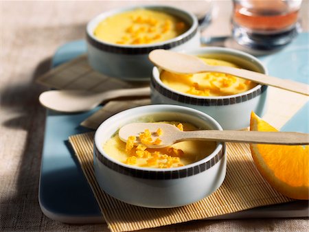 simsearch:652-03801638,k - Individual orange and star anise cream desserts Stock Photo - Rights-Managed, Code: 825-05812079