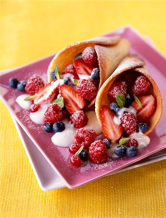 Tuile biscuit filled with summer fruit Stock Photo - Rights-Managed, Code: 825-05812333