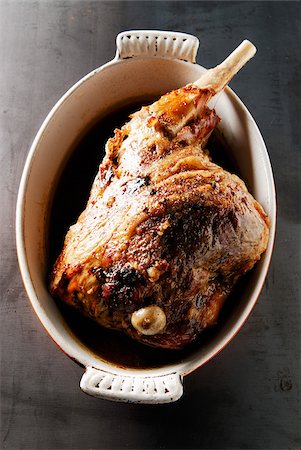 Leg of lamb cooked seven hours in the oven,served with a spoon Stock Photo - Rights-Managed, Code: 825-05812961