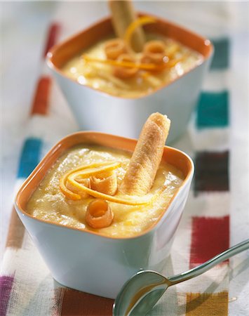 simsearch:652-03801064,k - Orange cream dessert with Cigarette Russe rolled biscuits Foto de stock - Con derechos protegidos, Código: 825-05813115