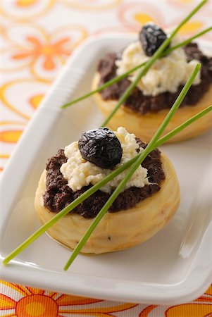 Artichoke mousse on a bed of Tapenade Stock Photo - Rights-Managed, Code: 825-05813183