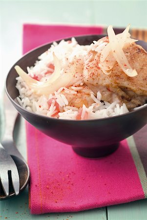 Chicken with onions and tomato rice Foto de stock - Con derechos protegidos, Código: 825-05813246