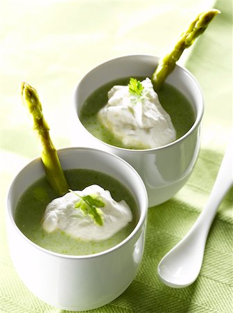 simsearch:825-06049250,k - Cream of green asparagus soup with whipped chervil cream Fotografie stock - Rights-Managed, Codice: 825-05813816