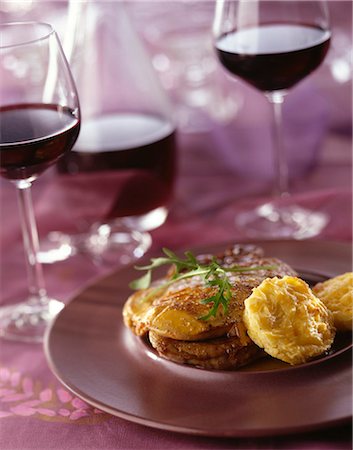 plate red wine glass - Rossini beef with foie gras and Marsala, gnocchis a la romana Stock Photo - Rights-Managed, Code: 825-05835554