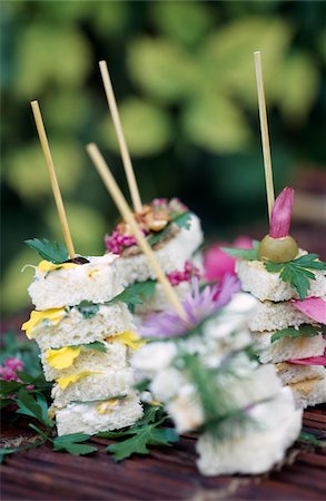 Club sandwiches with edible flowers Stock Photo - Rights-Managed, Code: 825-05835836
