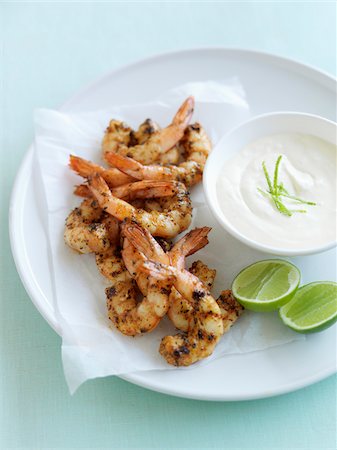Grilled shrimps with yoghurt and lime sauce Stock Photo - Rights-Managed, Code: 825-05836372