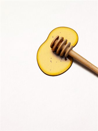 Honey and wooden honey spoon Stock Photo - Rights-Managed, Code: 825-05836620