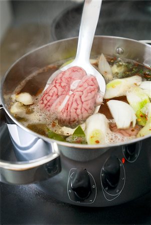 Cooking the brains in the broth Stock Photo - Rights-Managed, Code: 825-05836834