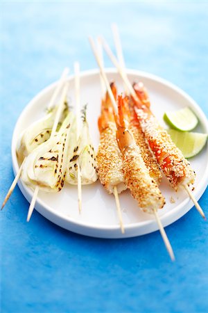 simsearch:825-05836952,k - Shrimp brochettes coated with sesame seeds and grilled fennel brochettes Stock Photo - Rights-Managed, Code: 825-05837185